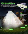 Outdoor view of Solar Motion Sensor Outdoor Lights 278 LED 3000 Lumen illuminating house with 32 ft detection range at night