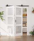60 By 96 Inch Preassembled Three Lite Frosted Glass Bifold Barn Door With 64 Inch Track Kit in white, installed in a kitchen.