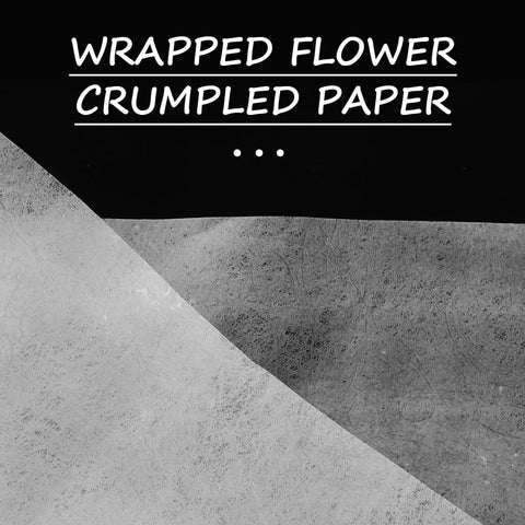 50 Sheets White Solid Color Folding Tissue Paper for Flower Wrapping and Florist Packaging showing texture and fold.