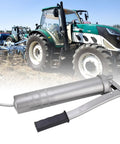 High Pressure Grease Gun 8000 PSI 400cc Manual Oiling Greaser in front of tractors on a field