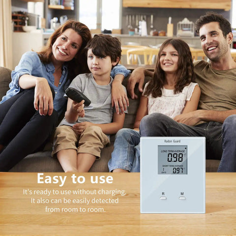 Family using Portable Home Radon Detector With Long And Short Term Monitoring, Battery Powered, No Fuss Setup, Easy Readouts And Real Time Readings in living room