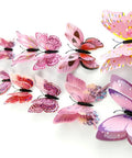 Mixed Pack Of 12 3D Pink Butterfly Wall Stickers For Home Decor On Smooth Surfaces arranged in a line