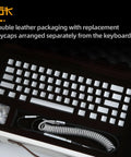 Compact 60 Percent Wired Mechanical Keyboard With Full Metal Chassis And Hot Swappable Red Switches Providing Customizable Rgb Lighting For Pc Gamers Wanting A Straight Durable Rig Upgrade That Is Totally Dialed In in double leather packaging with separated keycaps.