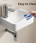 HAOCHRYSYPH Ceramic Wall Mount Bathroom Sink, Milk White, 14.18x10.24 in. being wiped clean with a cloth.