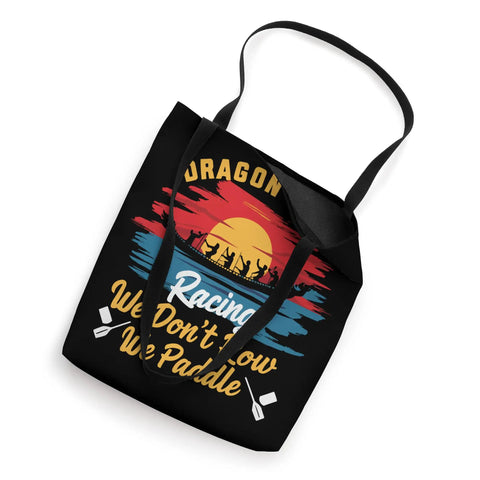 Black Dragon Boat Paddler Tote Bag with colorful paddling graphic and text 'We Don't Row We Paddle' for race day gear.