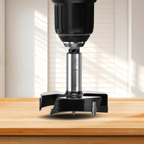 Top Shelf 35mm Carbide Forstner Drill Bit With Triple Flute Design mounted on drill, highlighting sharp edges for hardwood boring.