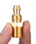 Close-up of an All Brass Four Piece Reusable Fittings Set for Quarter Inch ID Hose and NPT Rigid Barbed to NPT Connectors in hand.