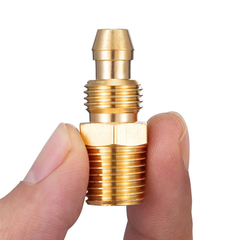 Close-up of an All Brass Four Piece Reusable Fittings Set for Quarter Inch ID Hose and NPT Rigid Barbed to NPT Connectors in hand.
