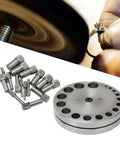 Steel Disc Cutter Set For Jewelry Making with 45 steel die discs and punch tools, shown in close-up with crafting hand.