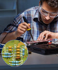 Person soldering circuit board with Massive 480 Piece Multilayer Ceramic Capacitor Kit With 24 Values From 10pF To 10uF in inset.