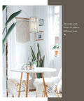 Crystal Chandelier 4-Tier Modern Pendant Light With Polished Chrome Finish above dining table with plants and macrame decor