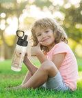 Child holding a 16oz Kid Sublimation Tumbler Set With Straws, 6 Pack, Stainless Steel, Double Walled, BPA Free, Kid Friendly And Durable