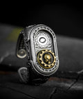 Straight Up Premium Warhammer 40K Adeptus Mechanicus Cipher Of The Machine God Ring For Men Gold Plated 925 Sterling Silver Gothic Gaming Jewelry With Custom Sizing Options detailed skull gear design on side view.