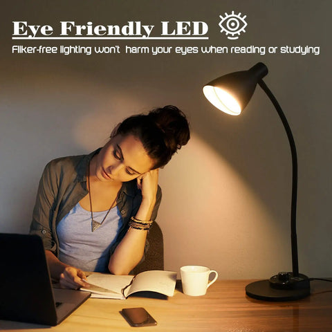 Woman reading by LED desk lamp with USB charger, three color temperatures, eye caring for office and bedroom, ten watt, adapter included.