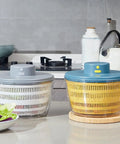 Massive 4L Electric Salad Spinner With Wireless Usb Charging Heavy Duty Veggie Dryer And Roomy Lettuce Bowl on countertop.