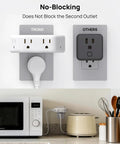 Compact 4 Socket Wall Outlet Extender With Surge Protector Plug And Play Multi Plug Adapter For Dorm Or Home No Sweat Charging Station Straight Up Reliable Grounded Power Strip White installed beside other plugs, showing no-blocking design.