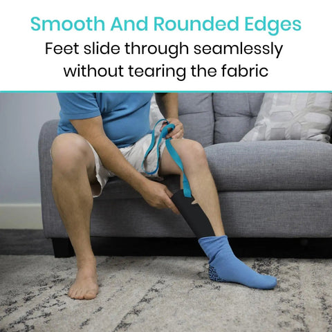 Sock Aid Easy On Easy Off Assist And Remover For Daily Living Helper With Patented Design No Bends Required No Sweat So Socks Go On And Off With Ease For Limited Mobility Recovery Seniors And Caregivers. Man using strap sock aid with smooth rounded edges
