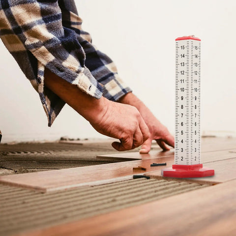 Person using the Dual Function Tile Contour Gauge And Ruler Level Tool for tile installation, showing high precision measuring on site.