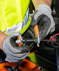 Worker using Solar Panel Insulating Wrench Set For MC4 Style PV Connectors with pro grade steel inserts on rooftop installation.
