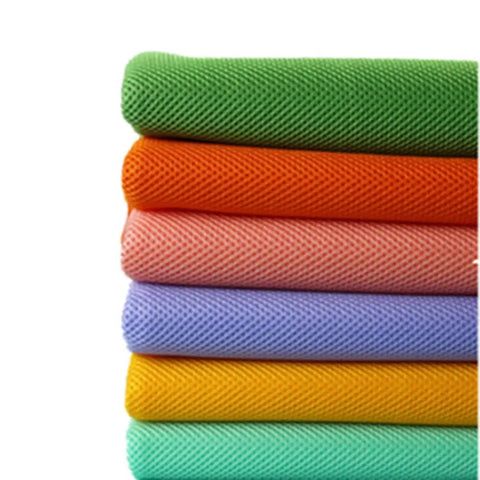 Stack of colorful mesh fabrics, featuring green, orange, pink, purple, yellow, and mint, for air beds upholstery and crafts.