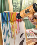 Using Beast 1800W Hot Air Heat Gun With Dual Temp Modes to melt crayons on canvas for crafts
