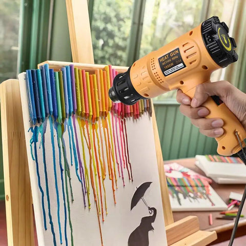 Using Beast 1800W Hot Air Heat Gun With Dual Temp Modes to melt crayons on canvas for crafts