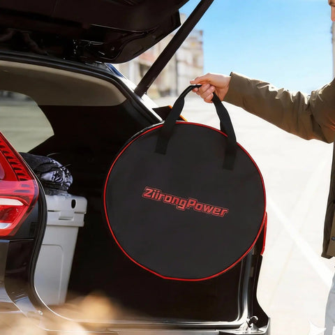 Person holding a bag with Portable Level 1 And 2 EV Charger With 25Ft Cable For On The Go And J1772 Plug, NEMA adapters visible