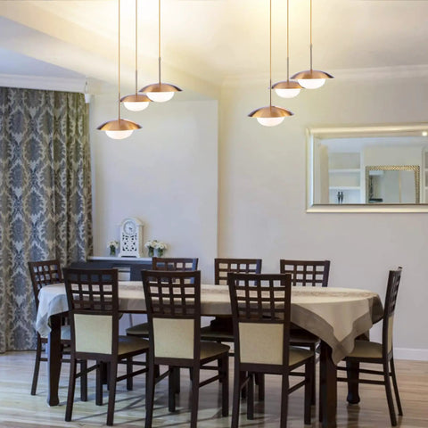 Dining room with Go-To Three-Light Modern Pendant Lighting With Double Shades And White Glass Globe Inside Brushed Brass UFO Fixture