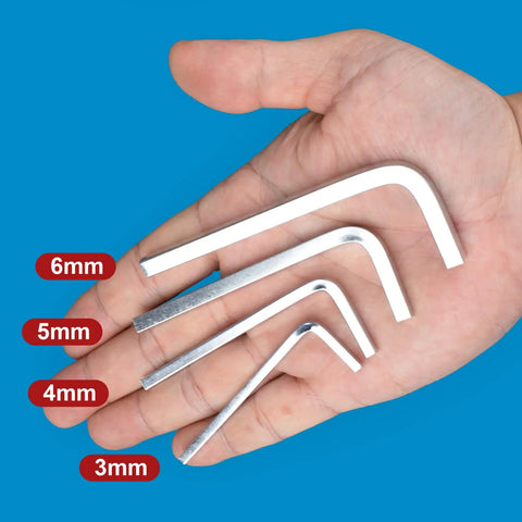 Four Piece L Shaped Square Head Wrench Set With 3mm 4mm 5mm And 6mm Sizes in a hand, showing ergonomic steel wrenches