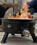 Smokeless 24 Inch Propane Fire Pit With Self Igniter 58K BTU Portable Outdoor Firebowl on wooden deck patio setting.