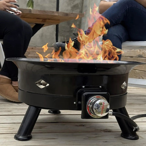 Smokeless 24 Inch Propane Fire Pit With Self Igniter 58K BTU Portable Outdoor Firebowl on wooden deck patio setting.