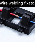 Heavy Duty Wire Welding Holder Clamp With High Temp Resistant ABS Base To Securely Grip Loose Cables For Soldering Home DIY Projects And Workshop Repairs Like A Pro close-up view of the clamp holding red and blue wires.