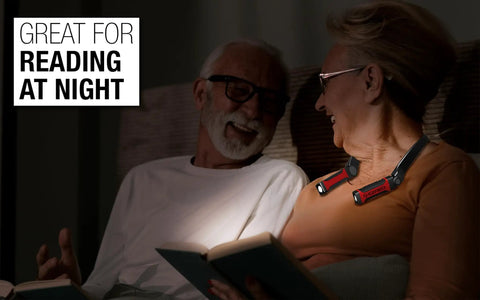 Man and woman using Anywear Neck Light For Hands Free Lighting With Four Modes From 50 To 200 Lumens Rugged Red And Black Gear.
