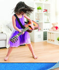 Top Tier Floating Floor Underlayment 200 Square Foot Roll With Hella Punchy Sound Dampening shown under a child playing guitar.