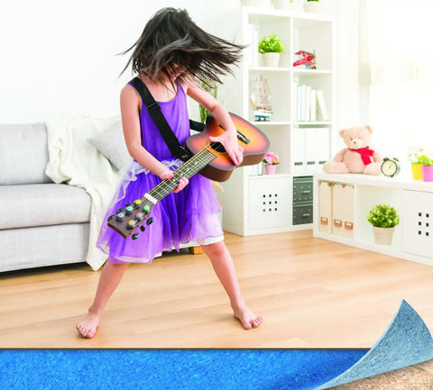 Top Tier Floating Floor Underlayment 200 Square Foot Roll With Hella Punchy Sound Dampening shown under a child playing guitar.