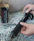 Person loading staples into Heavy Duty Hammer Tacker Stapler for 20 Gauge 1/2 Inch Crown with Quick Jam Release, Bottom Loading