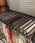 Smooth Rolling Pants Hanger Cart With Heavy Duty Wheels And Adjustable Trouser Racks For Jeans And Skirts, showing multi-colored trousers on a rack.