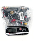 Level Up Your Build Game With Rock Solid 5 Plus 1 Speed With Reverse Transmission Gearbox Building Blocks Kit in plastic bag on scale.