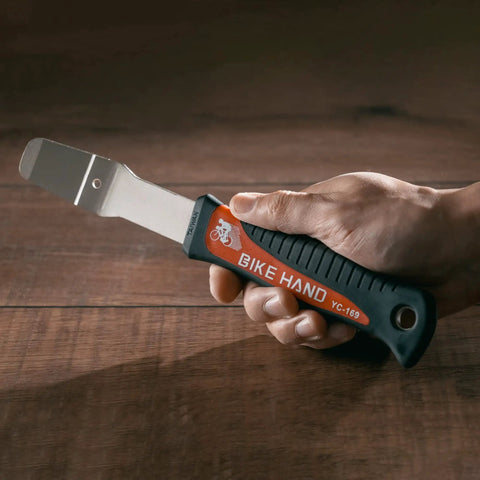 Hand holding Professional Hydraulic Disc Brake Caliper Piston Press Tool Wrench With Wedge Design And Extra Long Handle