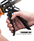 Close-up of hand gripping Pro Grade Dual Component Cartridge Gun for 400 ml Cartridges with ergonomic design and high thrust