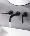 Matte Black Wall Mount Bathroom Faucet With Dual Handles, Solid Brass Construction, shown with water running, modern design