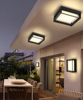 Square Flush Mount Outdoor LED Ceiling Light Fixture 9 Inch 120V 24W 3000K Black Waterproof For Wet Areas Porch Patio Coastal Ready Rust Resistant Aluminum And PC Shade installed on patio ceiling