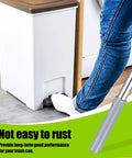 Heavy Duty Hydraulic Door Damper With Dead Silent Soft Close Piston Pump For No Sweat Setup On Bottom Or Side Hinged Trash Laundry Chute Doors close-up with foot pedal use.