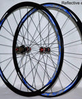 Beast 700C Carbon Wheelset with 30mm matte black rim, double wall aluminum, quick release hubs displayed with reflective effect