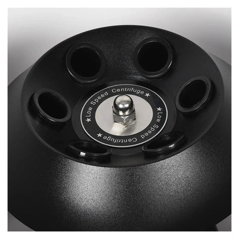 Compact Benchtop Microtube Centrifuge With Whisper Quiet Motor And Rock Solid Base Designed For Tiny Labs While Smoothly Spinning Eight Tubes top view showing eight vial openings and low speed label.