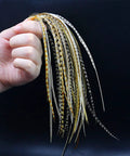 Hand holding Rooster Saddle Fly Tying Feathers Pack for Midge and Dry Fly Hackle, 9 to 11 inches, mixed colors, 10 feathers