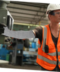 Tough As Nails Cut Resistant Arm Sleeves With Thumb Hole Grip Breathable Mesh Work Guards For Mechanics And Gardeners Solid Hustle Protection Daily Grind Armor worn by worker in safety gear, operating machinery.