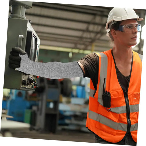 Tough As Nails Cut Resistant Arm Sleeves With Thumb Hole Grip Breathable Mesh Work Guards For Mechanics And Gardeners Solid Hustle Protection Daily Grind Armor worn by worker in safety gear, operating machinery.