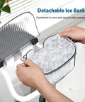 Person removing ice basket from Nugget Ice Maker Countertop Portable Chewable Pellet Ice Machine With Auto Cleaning Function 34 Lbs Per 24 Hours Durable Stainless Steel Body For Kitchen Office And Home Use Silver.