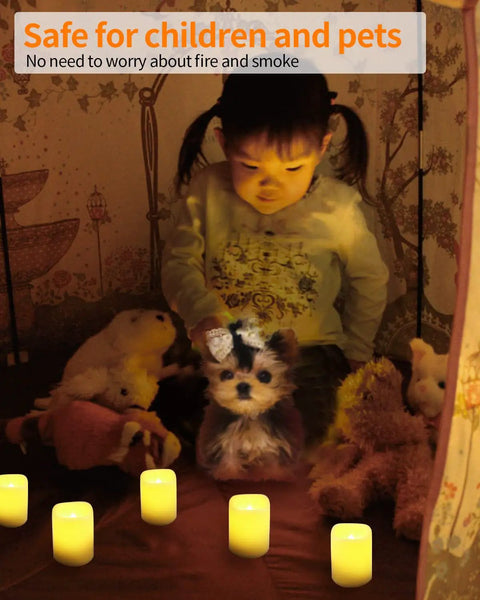 Child playing with dog surrounded by Flameless Votive Candles Set 2 Inch 24 Pack Battery Operated LED With Realistic Flicker Warm White